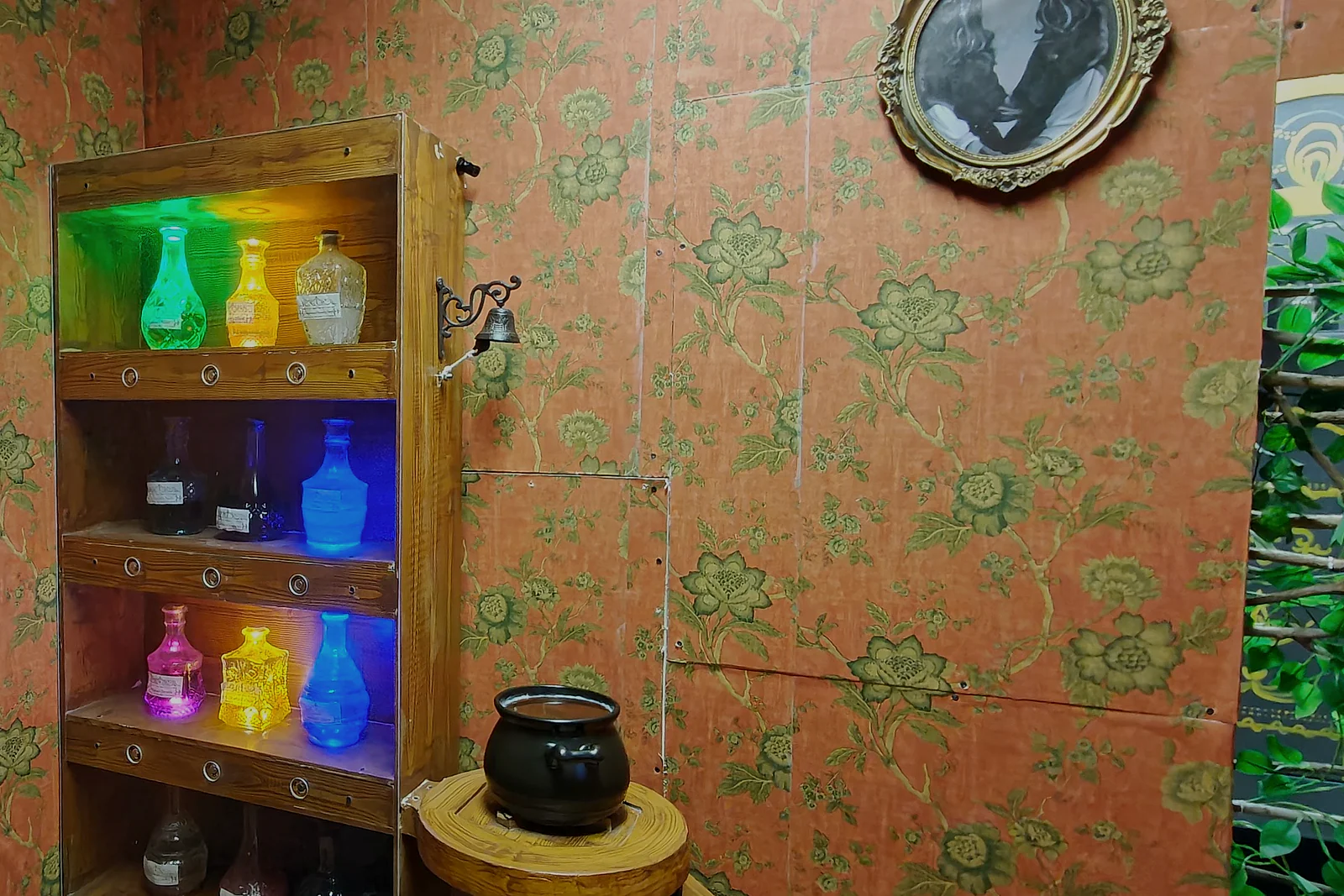 Glowing potion bottles inside Erin’s Diary escape room